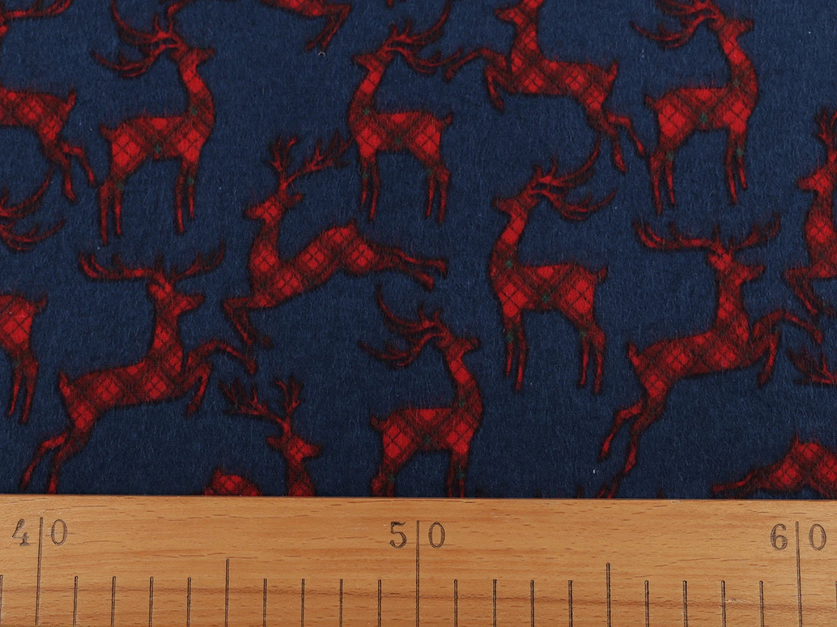 Christmas cotton flannel with deer on blue