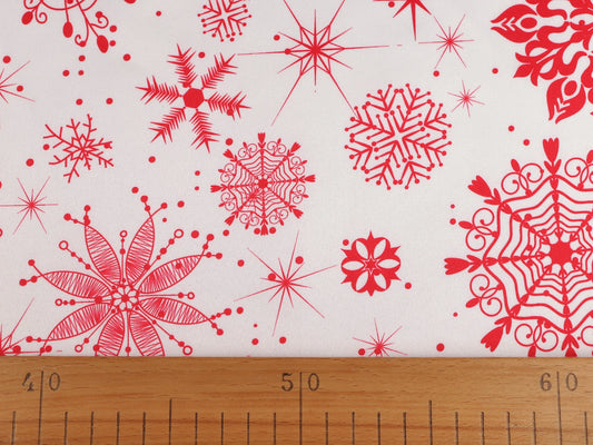 Christmas satin fabric with snowflakes