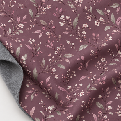 softshell fabric with floral pattern on dusty pink background