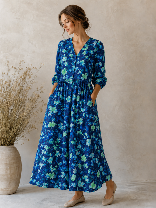 Linen with cotton - leaves on a blue background 170 g/m²