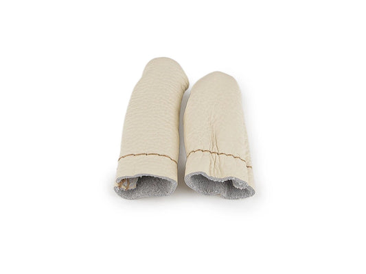 Image of leather finger guards for felting – available online at Šarlotes audumi