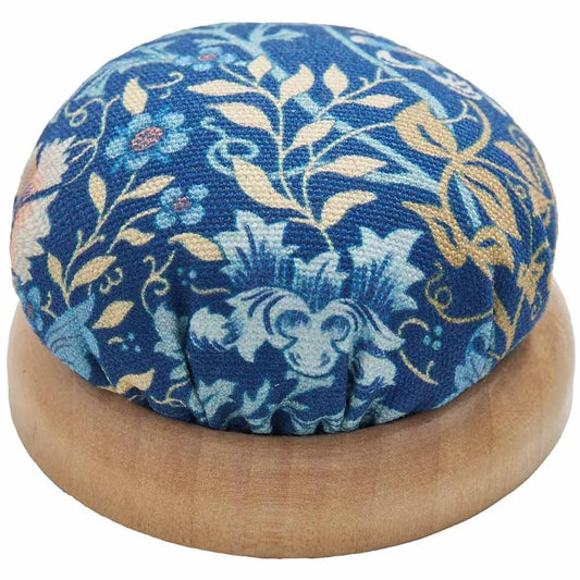 Image of a needle cushion with a wooden base and floral pattern, Hobby Gift – available at Šarlotes audumi