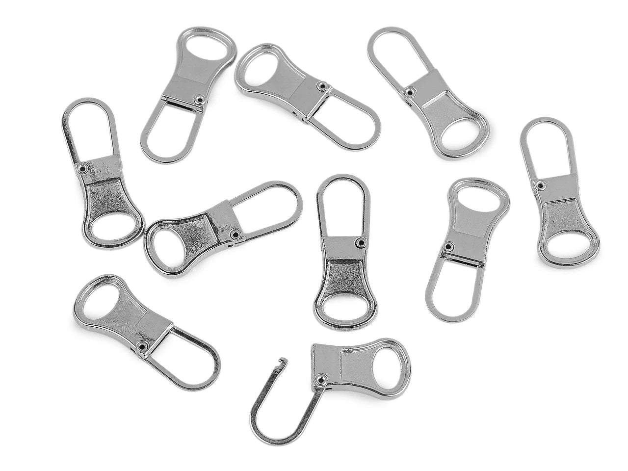 Image d’un curseur de fermeture éclair métallique ouvrable pour réparation – 10 × 27 mm – disponible en ligne chez Šarlotes audumi