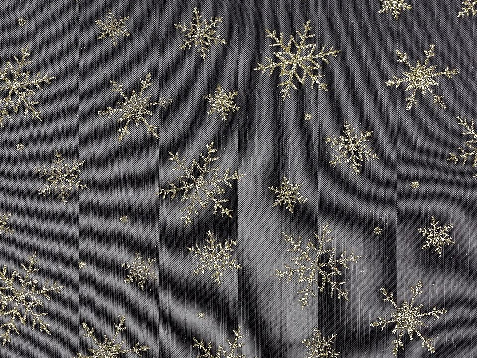 Image of white organza with gold glitter snowflakes – available online at Šarlotes audumi