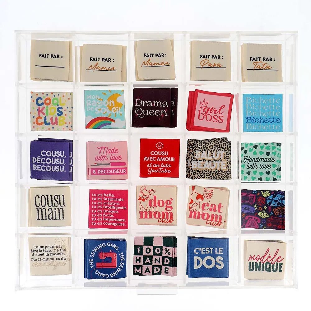 Image of Bohin sew-in clothing labels “Who Run The Word” – 35 × 35 mm, 4 pcs – available online at Šarlotes audumi