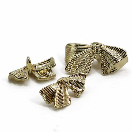 Metal shank buttons for bows