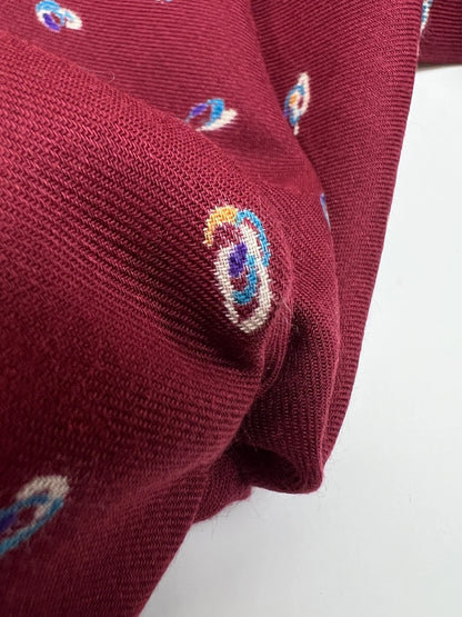 Italian twill fabric in burgundy with a subtle pattern 125 g/m²