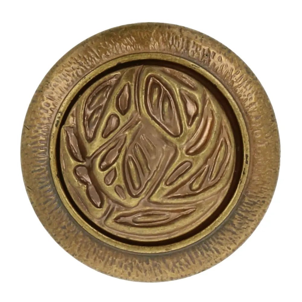Image of a decorative button with a heart element - antique - available online at Charlotte's Fabrics