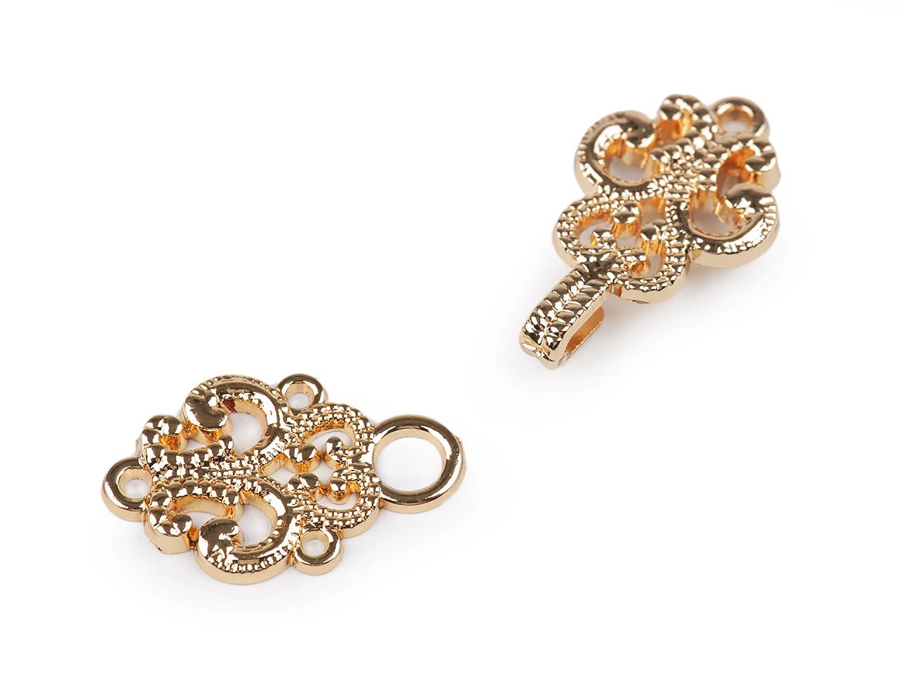 Image with decorative fastening hook for clothing|available in various shades – available at Charlotte's Fabrics