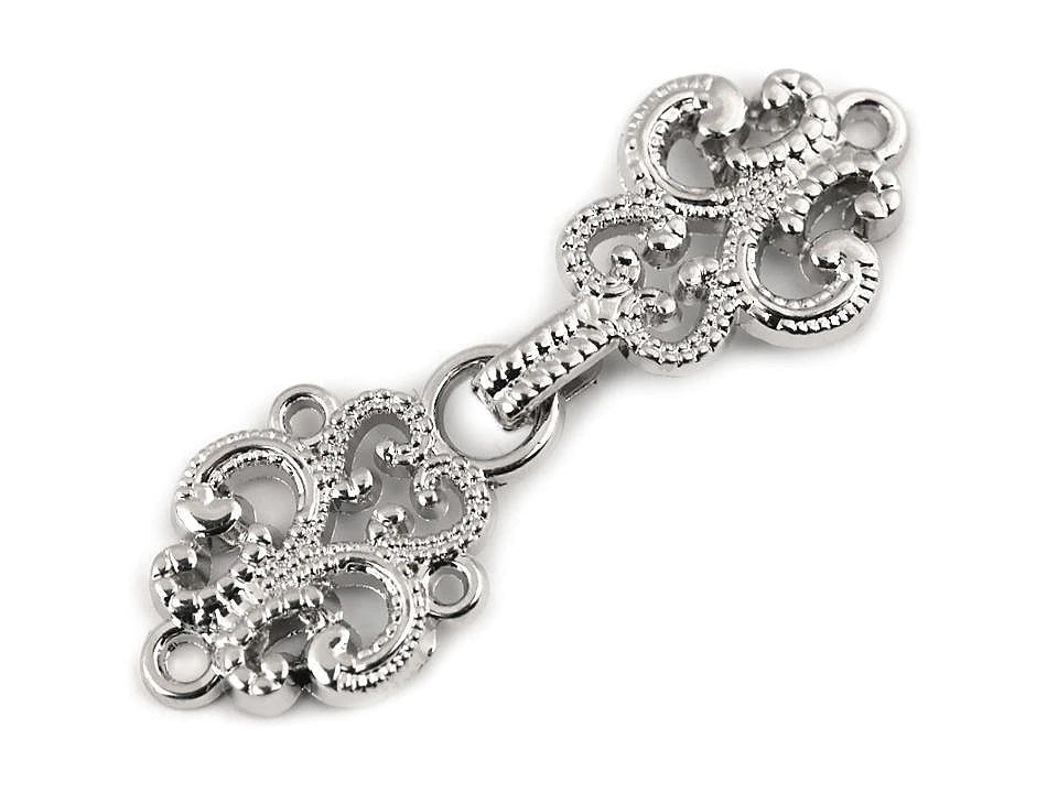 Image of a decorative hook clasp for clothing|in various shades – available at Šarlotes audumi