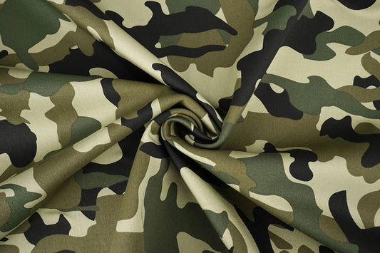 Image of denim fabric with camouflage pattern – Army Green 275 g/m² – available at Šarlotes Audumi