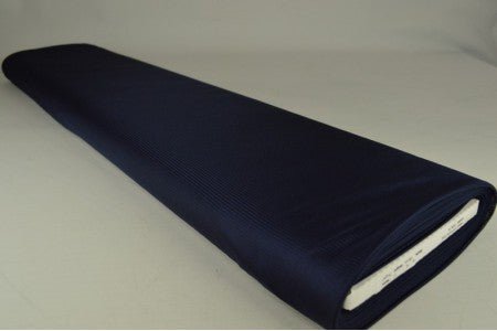 Image d’une doublure en jersey extensible - bleu foncé 75 g/m² – disponible chez Šarlotes audumi