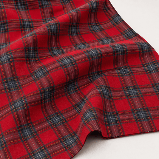 Image of red plaid flannel – available online at Šarlotes audumi