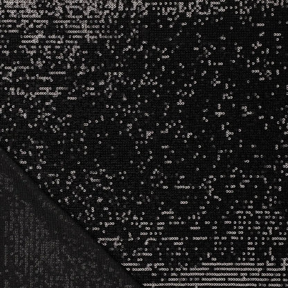 Image du tissu à paillettes noir 285 g/m² – disponible chez Šarlotes audumi