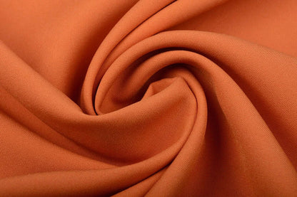 Image de gabardine orange – disponible en ligne chez Šarlotes audumi