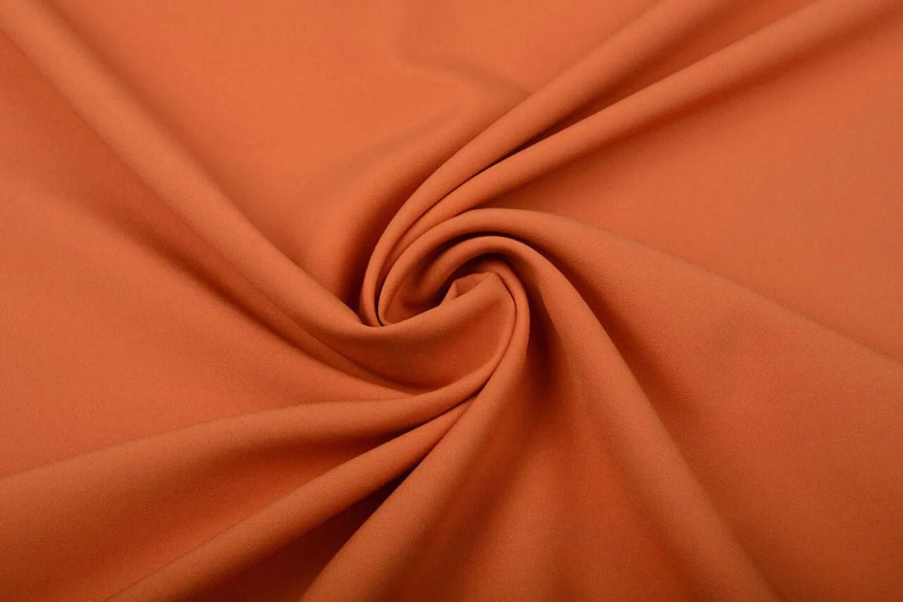 Gabardine orange disponible en ligne chez Šarlotes audumi