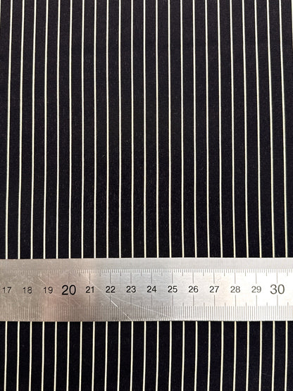 Image of 100% Italian silk fabric with a fine black striped pattern – available online at Charlotte's Fabrics