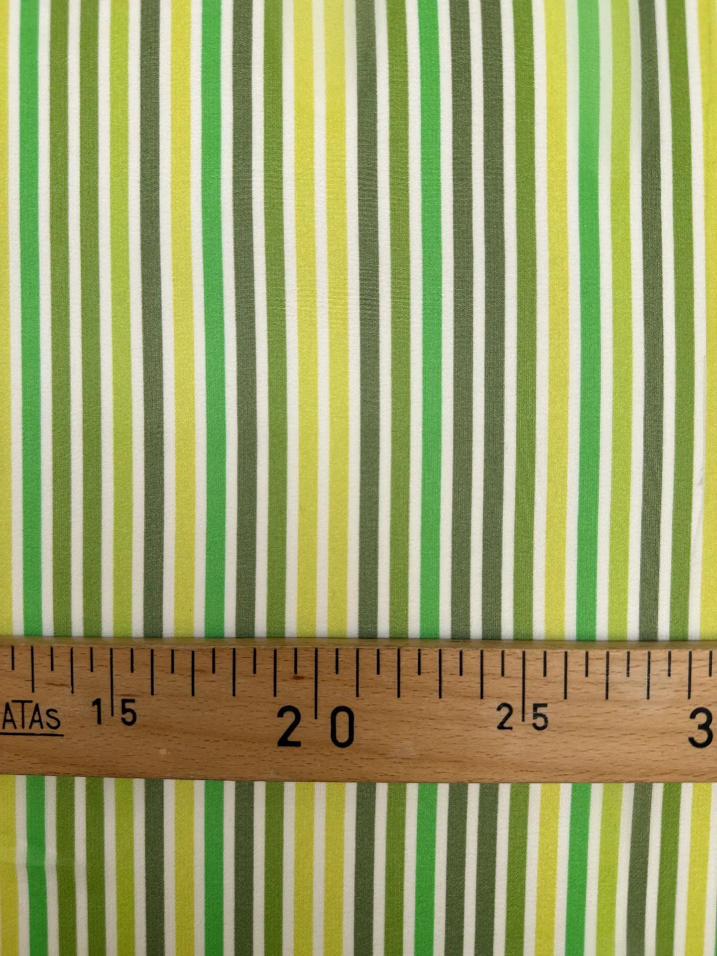 Image of Italian 100% silk crepe fabric - green stripes, available online at Charlotte's Fabrics