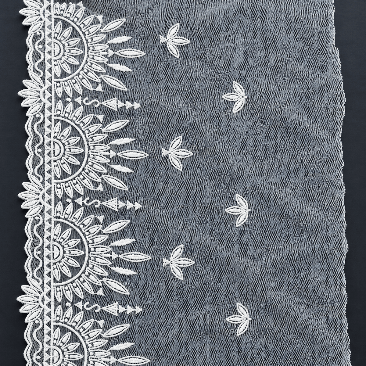 Image of embroidered lace on tulle, 20 cm, porcelain white – available online at Šarlotes audumi