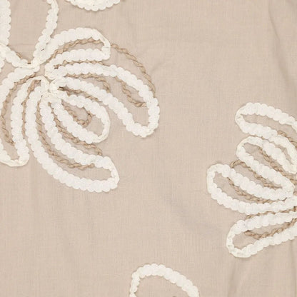 Image of embroidered cotton fabric with a floral pattern, natural tone, 150 g/m² – available at Šarlotes audumi