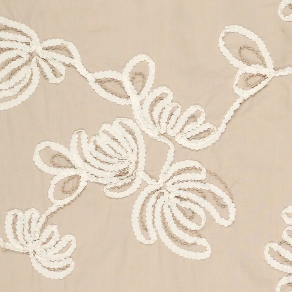 Image of embroidered cotton fabric with a floral pattern, natural tone, 150 g/m² – available at Charlotte’s Fabrics