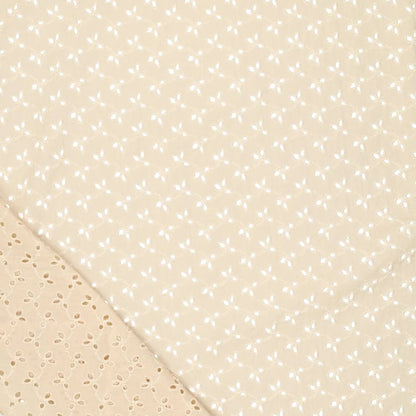 Tissu en coton brodé - broderie sur fond beige 115g/m²