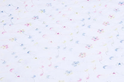 Tissu en coton brodé - broderie colorée 110 g/m²