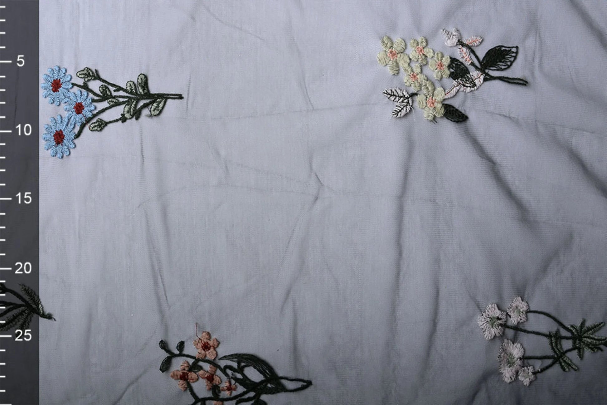 Image of embroidered tulle with flowers 100 - 150 g/m² – available at Šarlotes audumi