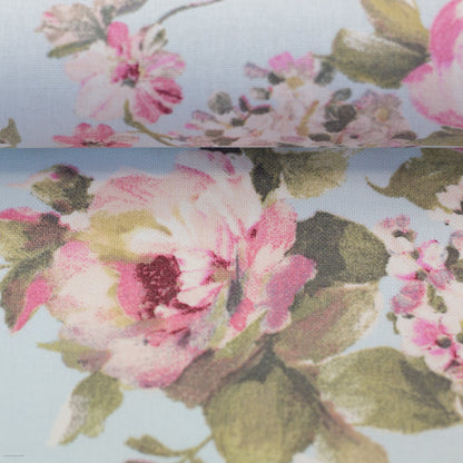 Canvas fabric with roses on a light blue background 200 g/m²