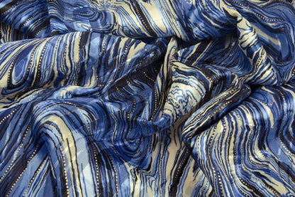 Image of dress fabric with a metallic effect - starry skies 110 g/m² – available at Charlotte's Fabrics