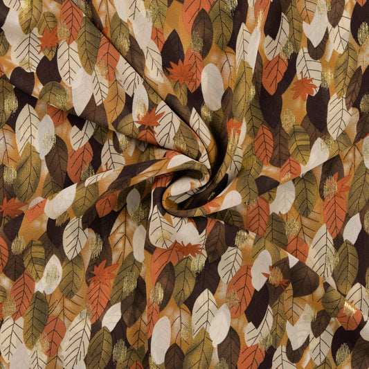 Image of dress fabric with gold leaf accents – available online at Charlotte's Fabrics