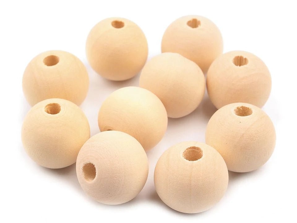 Image avec perles en bois Ø18 mm | Bois naturel, non traité – disponible chez Šarlotes audumi