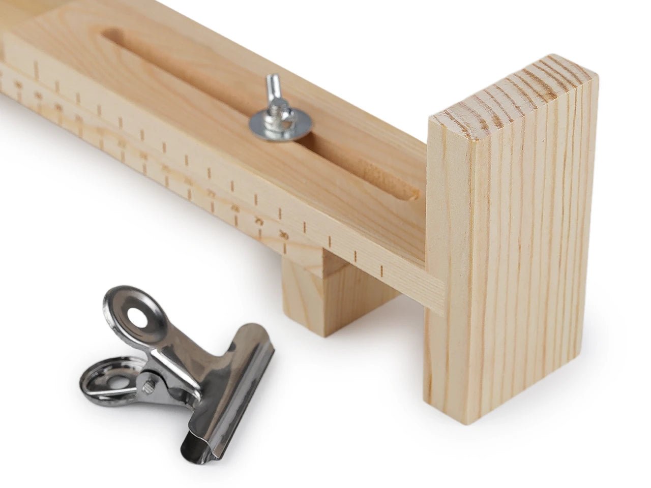 Image of a wooden loom for weaving bracelets – available at Charlotte's Fabrics