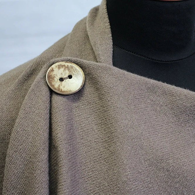 Image of a 15 mm two-hole coconut button – available online at Charlotte's Fabrics