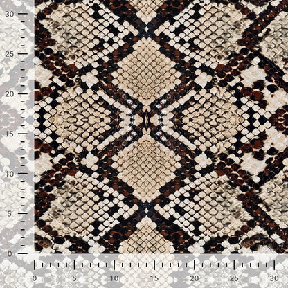 Image of cotton loop-knit with snakeskin print – available online at Šarlotes audumi