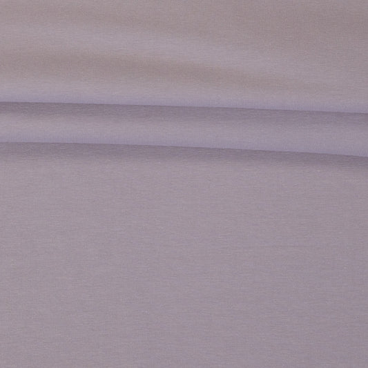 Image with cotton loopback jersey fabric in smoky lilac pink – available online at Šarlotes audumi