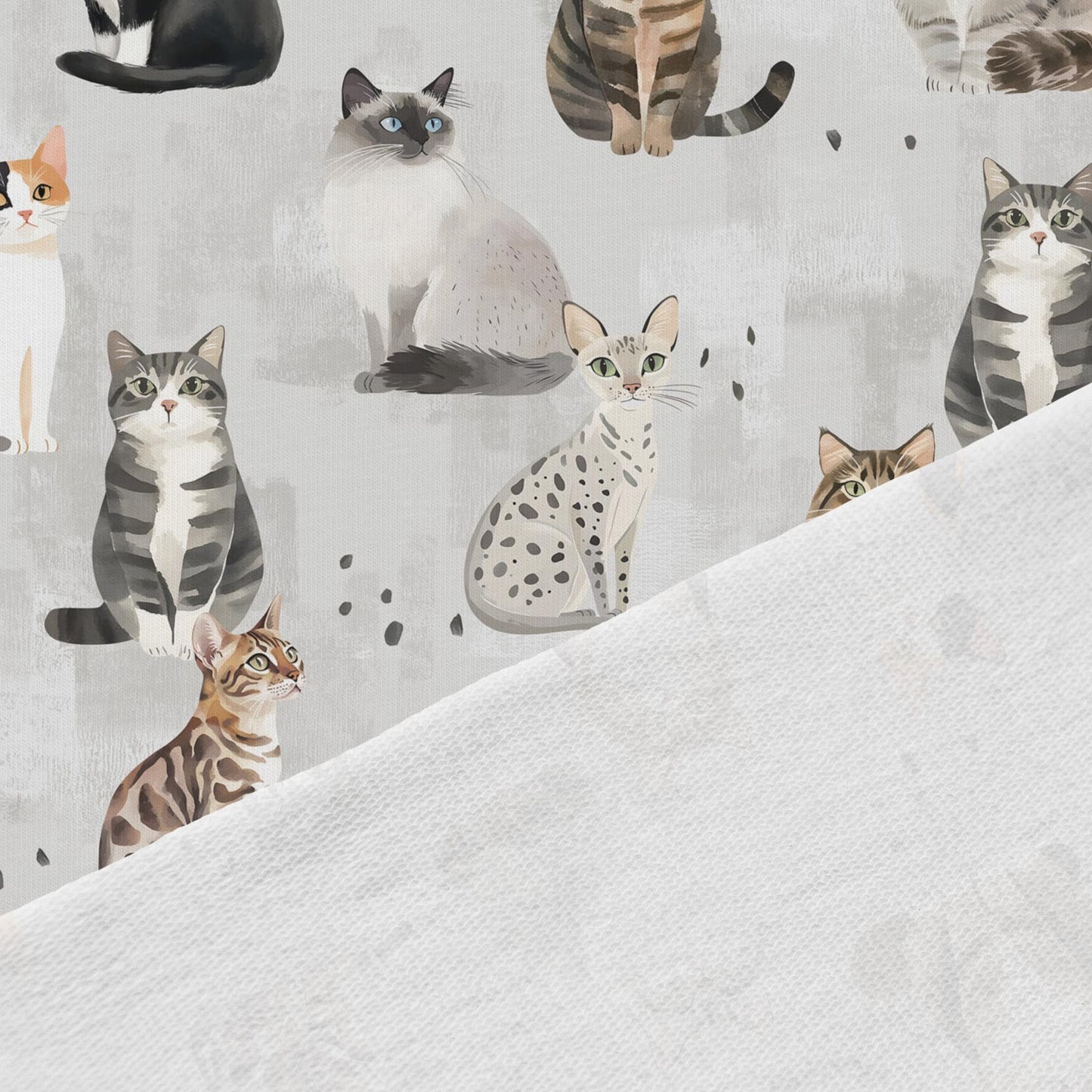 Image d’un chat en jersey bouclette en coton sur fond gris – disponible en ligne chez Šarlotes audumi