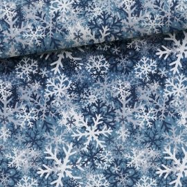 Image with cotton loopback knit - snowflakes on a blue background 250 g/m² – available at Šarlotes audumi