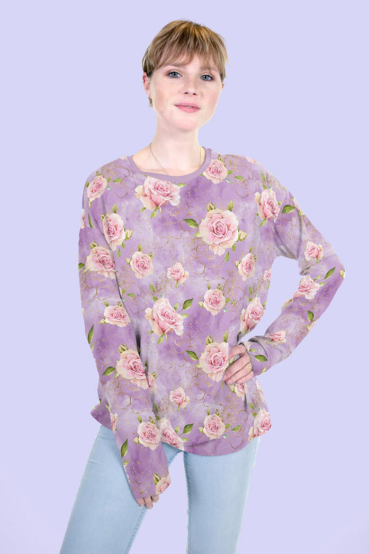 Image of cotton loop-knit roses on lilac – available online at Šarlotes audumi