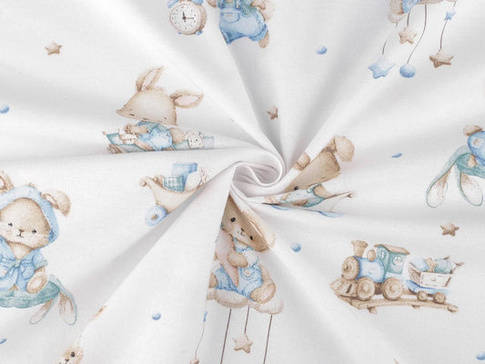 Image of cotton flannel with rabbits in blue accents – available online at Šarlotes audumi