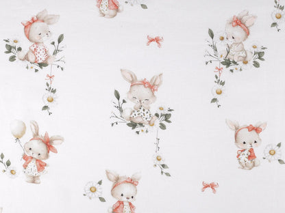 Image of cotton flannel with bunnies in pink bows – 100% cotton – available online at Šarlotes audumi