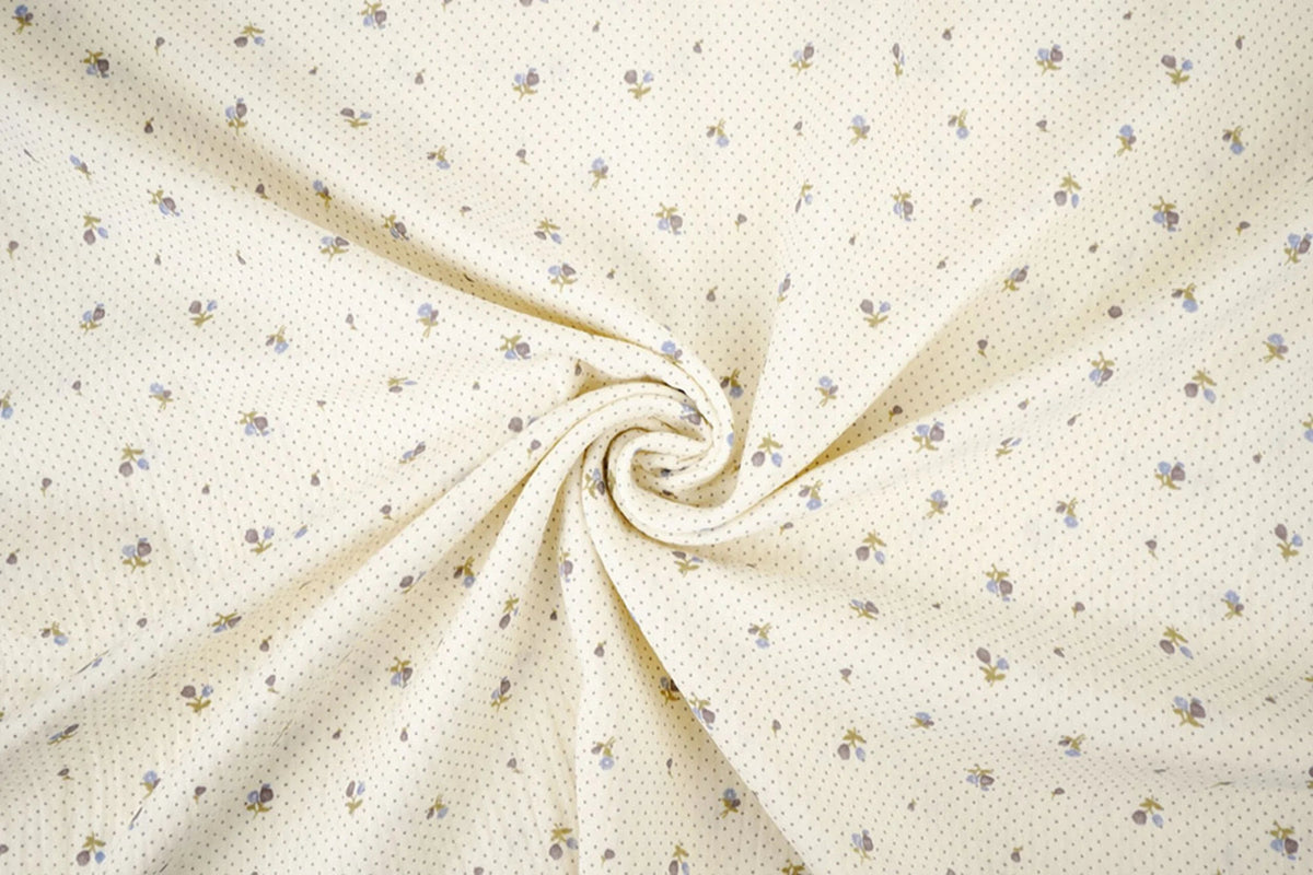 Cotton muslin with tiny flowers and dots - available online at Charlotte Fabrics