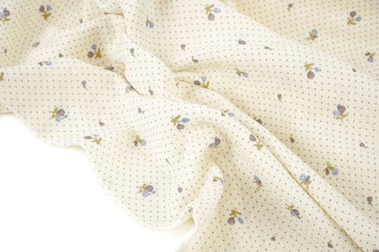 Cotton muslin with tiny flowers and dots - available online at Charlotte Fabrics