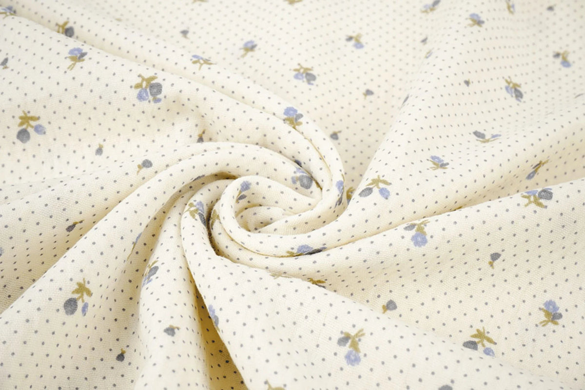 Cotton muslin with tiny flowers and dots - available online at Charlotte Fabrics