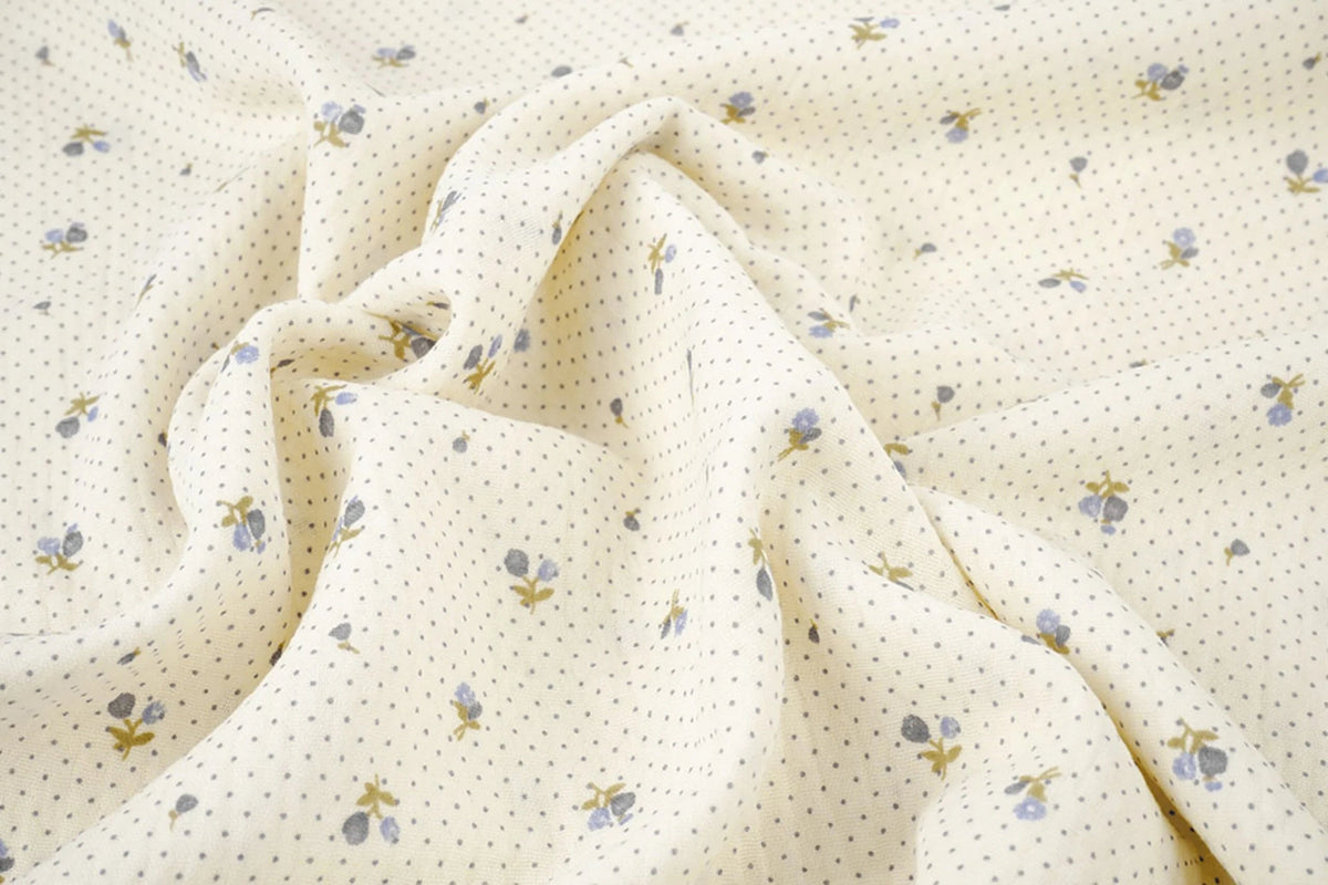 Cotton muslin with tiny flowers and dots - available online at Charlotte Fabrics