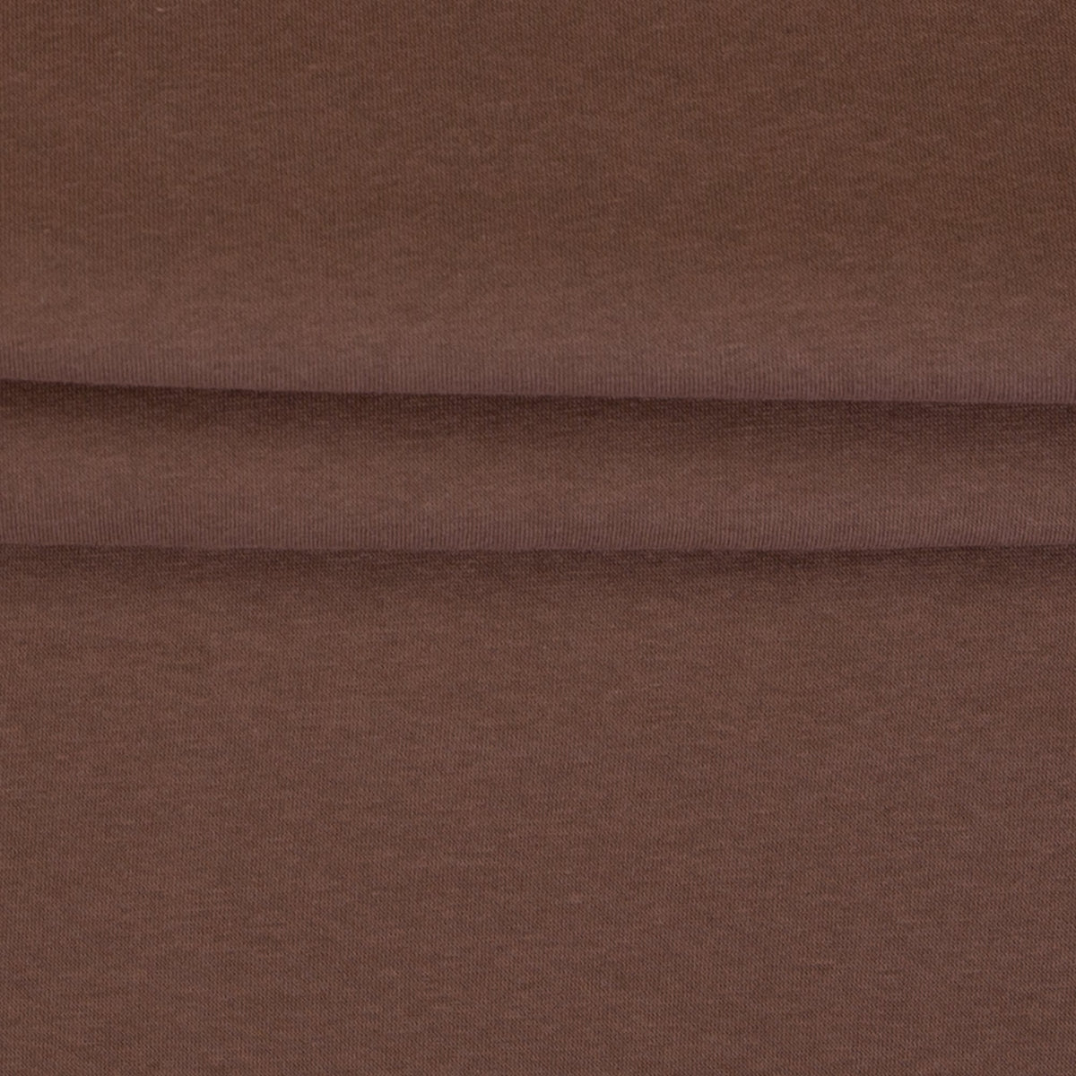 Image of cotton-lined knit fabric in cinnamon brown – available online at Šarlotes Audumi