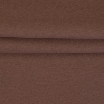 Image of cotton-lined knit fabric in cinnamon brown – available online at Šarlotes Audumi