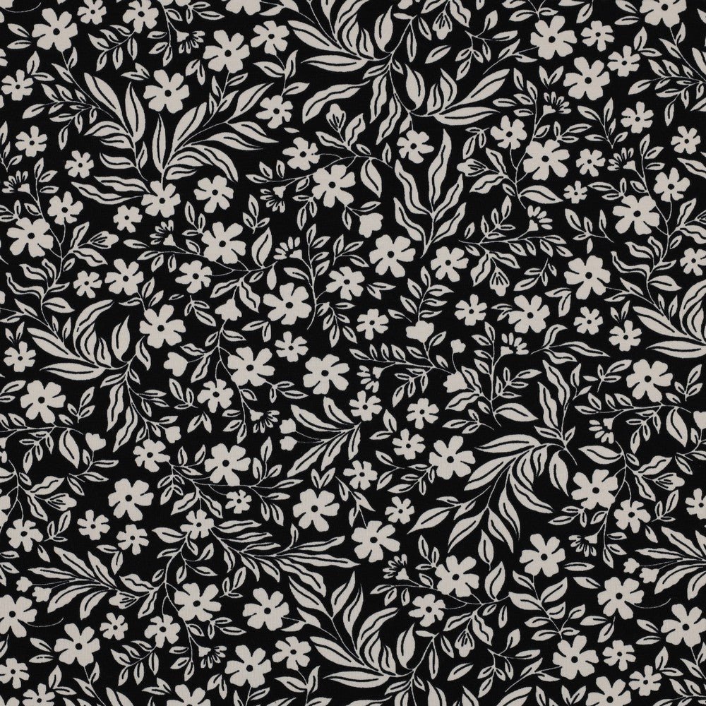 Image with cotton knit fabric - white flowers on black 200 g/m² – available at Šarlotes audumi