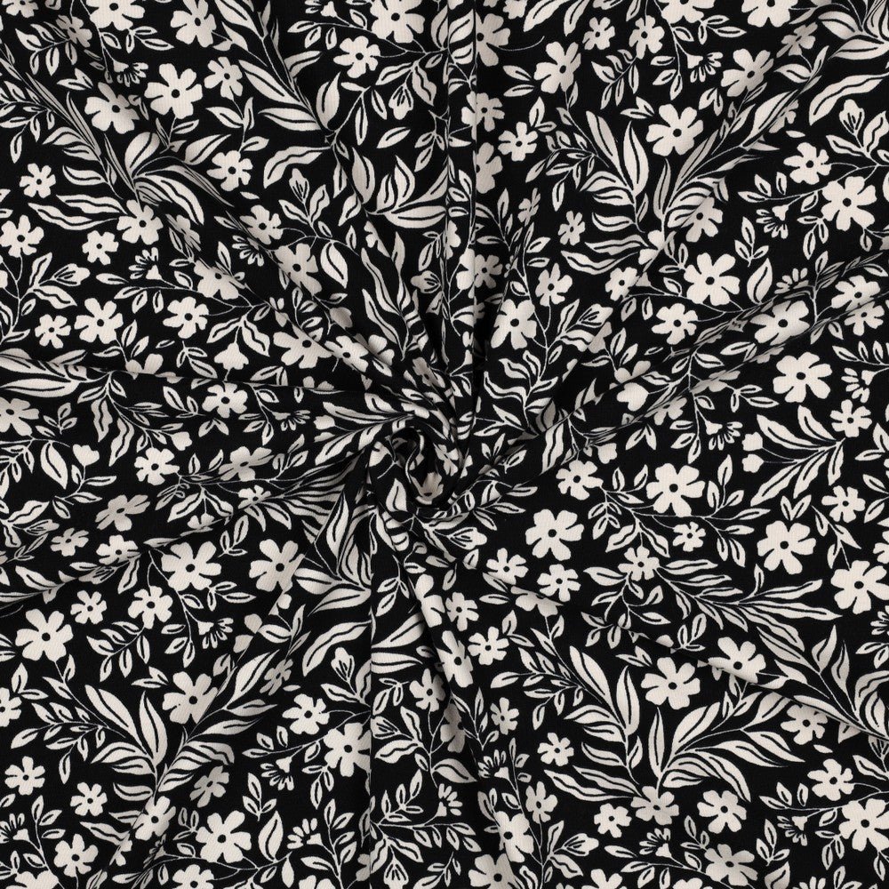 Image with cotton jersey - white flowers on black 200 g/m² – available at Šarlotes audumi