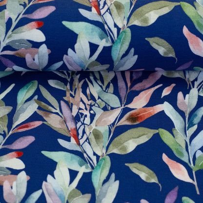 Cotton jersey - leaves on a blue background 200 g/m²